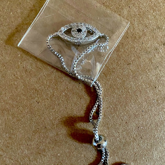 Diamond & Blue Sapphire Crystal Evil Eye Bracelet – Spectra  Crystal evil eye bracelet